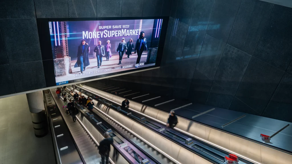 An advert for Money Supermarket on the London Underground using digital entrances.