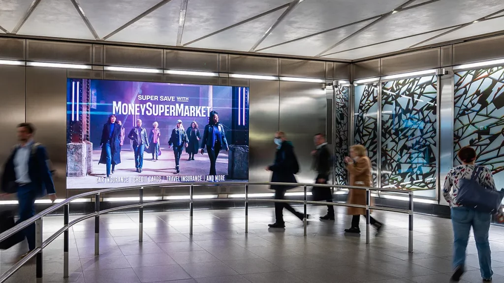 An advert for Money Supermarket on the London Underground using digital entrances.
