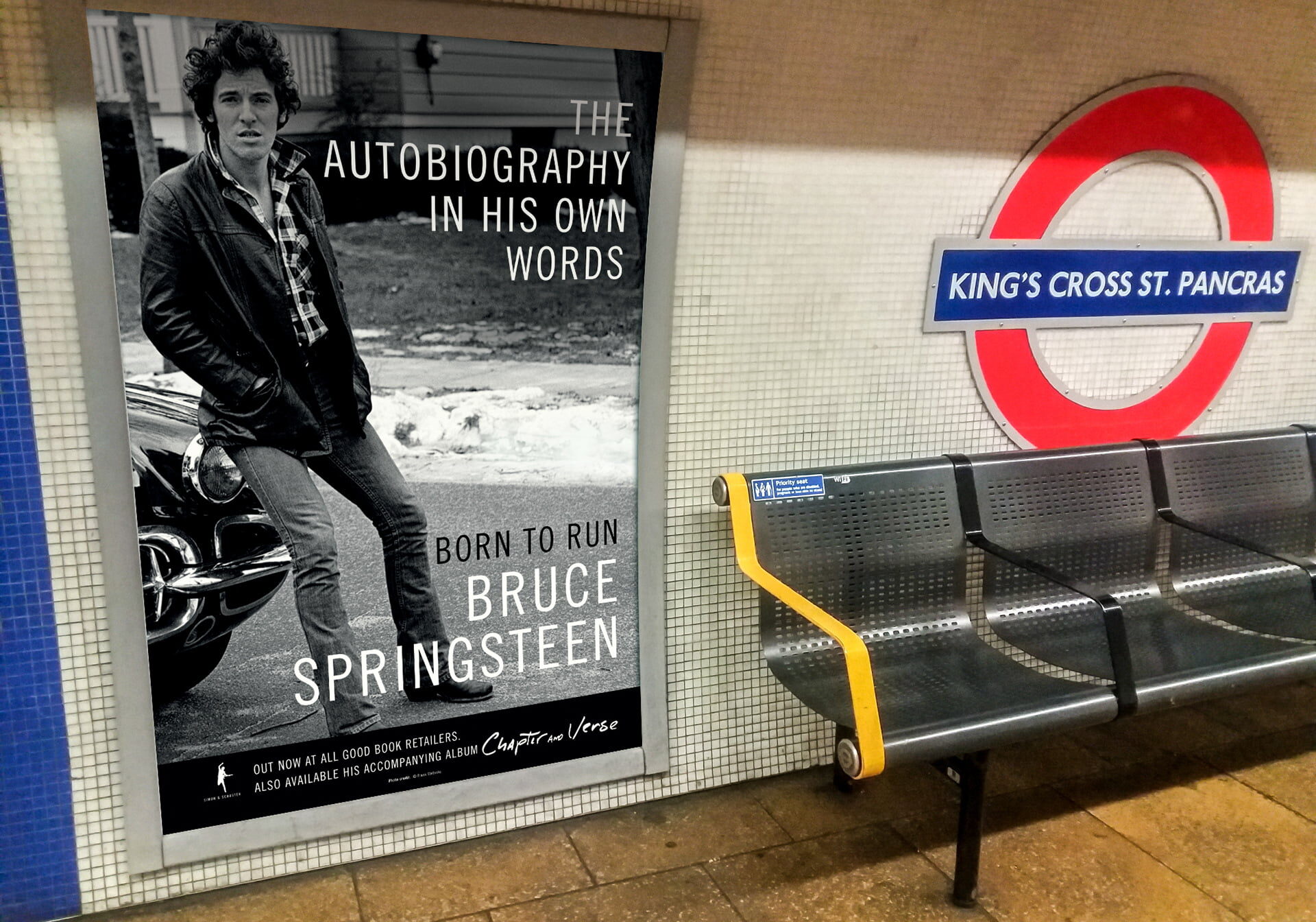 An advert for Bruce Springsteen displayed on the London Underground using 4 Sheet posters. This is at King's Cross St Pancras station.