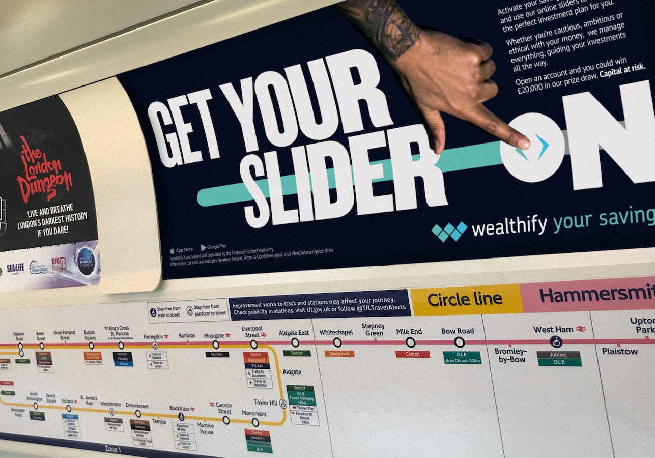 An advert for Wealthify displayed on the London Underground using Tube Car Panels.